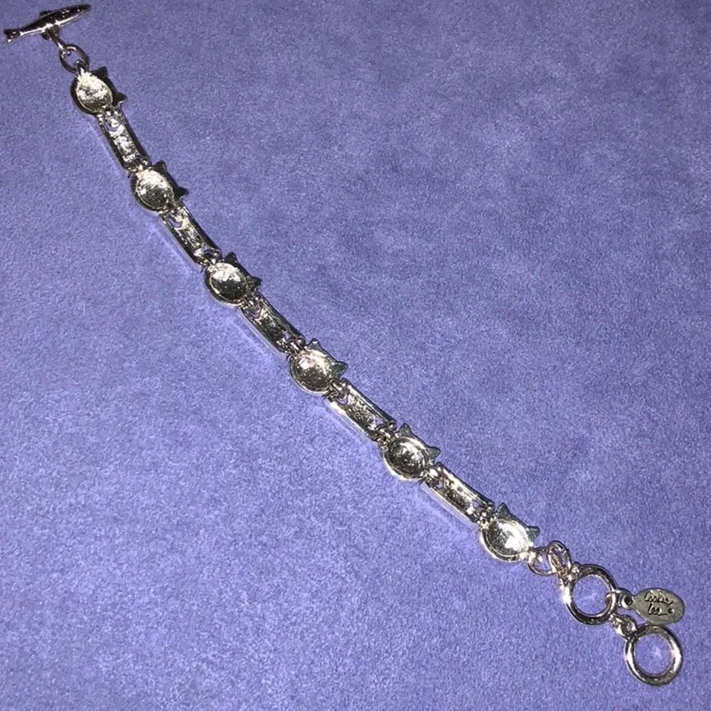 Cookie Lee Silver Tone Cat Fish Link Tennis Bracelet Retired Adjustable